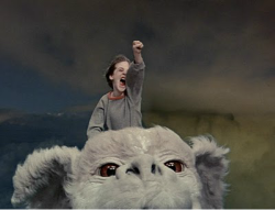 Bastian riding Falcor, never ending story, Bastian fist in the air